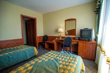 Фото номера Двухместный номер с 1 кроватью или 2 отдельными кроватями Отель Hotel Pietrak г. Trzemeszno 4